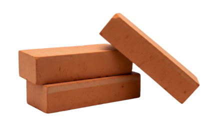 Three red clay bricks stacked and leaning, essential building materials for construction and home improvement projects