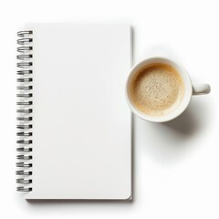 Blank spiral-bound notebook and coffee cup on white background