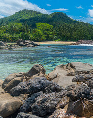 Rocks by the water in a tropical beach