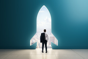 Businessman standing at rocket-shaped door in blue wall, gazing at city skyline, symbolizing...