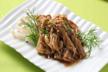 Enoki mushrooms pickled in fermented soy sauce with garlic. Promotes gut health and digestion. A...
