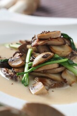 Creamy mushroom stir-fry, a decadent Korean fusion dish prepared with rich sauce by master chef Hanshunseop.
