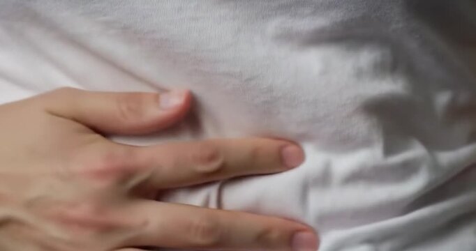 Extreme close-up of a bloated stomach with digestive discomfort