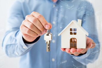 Unlock Your Future A Man Holding Keys and a Miniature House Symbolizing Home Ownership and Real Estate Investment with a Modern Cityscape Backdrop