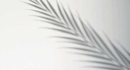 Obraz premium A single green leaf isolated on soft cream background, eco minimalism.