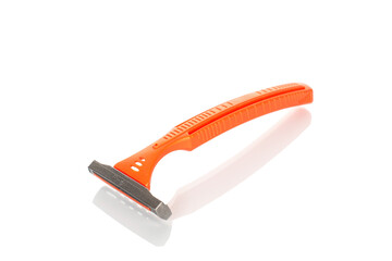Disposable razor isolated on white background, close-up.