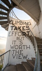Inspirational Quote on Spiral Staircase Emphasizing Journey and Reward