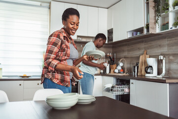 Couple Doing Dishes Together in Modern Kitchen