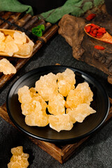 Yellow Rock Candy Crystals in Traditional Setting with Ancient Mortar and Pestle