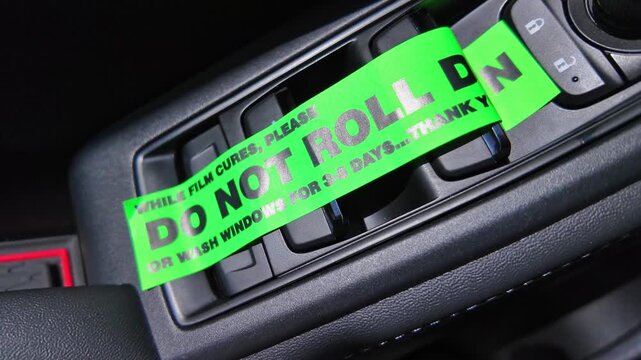 Do not roll down or wash windows, sticker on the vehicle door buttons, reminder to driver, after window tinting for reduce glare, block harmful UV rays, and help control interior temperatures.