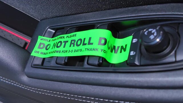 Do not roll down or wash windows, sticker on the vehicle door buttons, reminder to driver, after window tinting for reduce glare, block harmful UV rays, and help control interior temperatures.