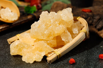 Handmade Yellow Rock Candy Sugar Crystals in Traditional Bamboo Basket - Ancient Sweet Manufacturing Technique