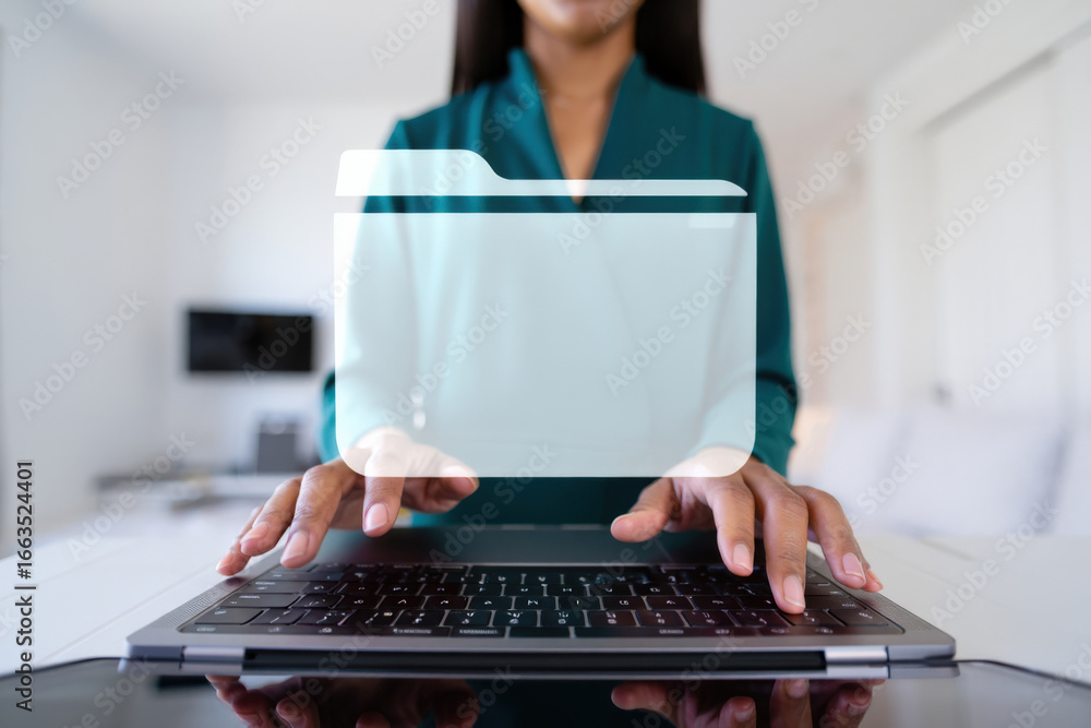 Poster professional woman typing on laptop with folder icon overlay representing digital file management an