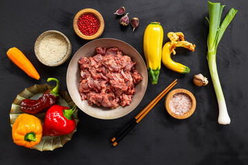 Marinated beef and vegetables for making Asian beef stir fry top view