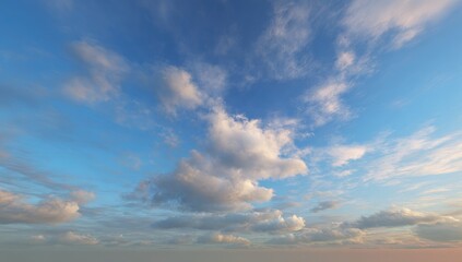 Obraz premium A vast expanse of a light blue sky dotted with fluffy, scattered clouds of varying shades of white and gray. Soft, pastel hues of peach and light orange at the horizon