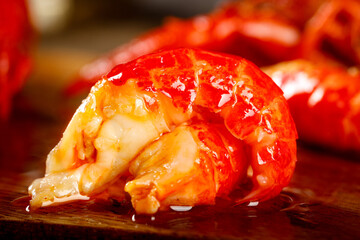 Deep Fried Spicy Crayfish with Red Shell on Wooden Table - Delicious Seafood Cuisine