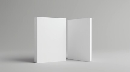 Two hardcover vertical white mockup books standing on the white background. Blank front cover and spine of book 