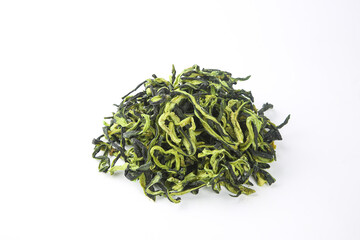 Dried Green Cucumber Strips on White Background - Dehydrated Vegetable Food Ingredient