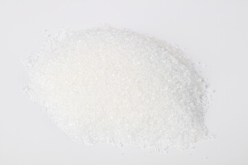 Fine White Granulated Sugar Crystals on White Background - Sweet Edible Ingredient