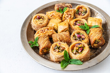 Traditional turkish, arabic sweets baklava assortment with pistachio