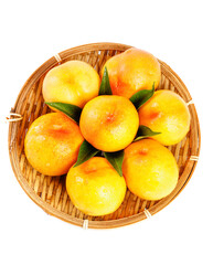 Fresh Golden Nectarines in Wicker Basket on White Background
