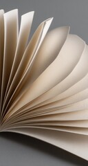 Cream-colored paper fanning out