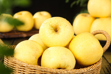 Fresh Yantai Apples in Wicker Basket - Organic Yellow Fruit Harvest Display