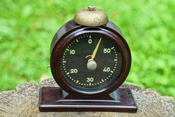 one mechanical classic table old retro round with iron bell brown with black dial and white arrows ...