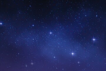 Deep space, dotted with numerous stars of varying brightness, in a rich indigo and dark blue night sky