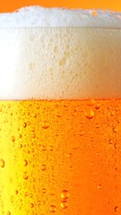 Amber lager abstract with bubbles and creamy foam