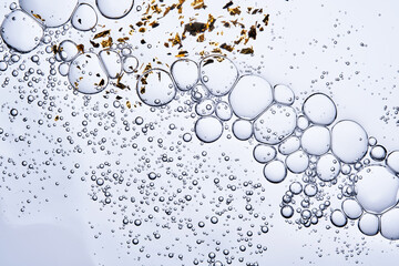 Abstract background with textures of three serums flocked into one.