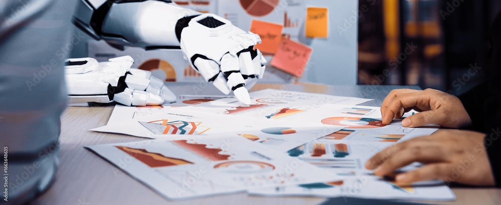 Poster A robotic hand writes on printed charts and graphs in a contemporary office, showcasing the integration of AI technology in data analysis and business decision-making.Noogenesis