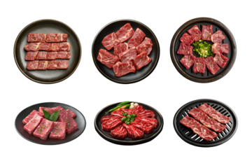 An assortment of fresh cuts of beef beautifully arranged on black plates. Perfect for culinary enthusiasts and food lovers.