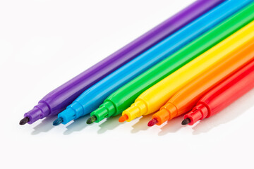 Markers of rainbow colors isolated on white background
