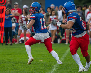 QB pass running back High School Football Boys of Fall Sports