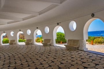 Interior of  Kallithea springs rotunda, (Terme Kalithea), white ceiling, pebble mosaic floor and...