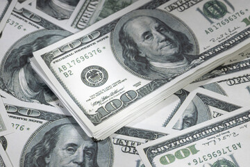Money background. Closeup of US dollar banknotes. Hundred dollar bills. American currency