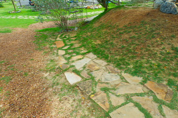 Garden landscape design with pathway in garden and footpath in picturesque summer park and...