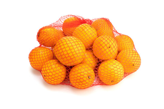 Orange fruits on net bag isolated on white background