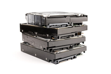 Pile of computer Hard disk drive HDD isolated on white background. Computer hardware data storage