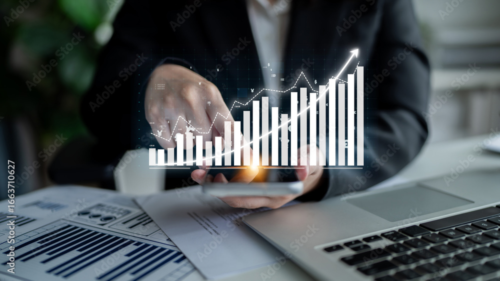 Poster a businessperson engages with a smartphone displaying financial graphs, highlighting data analysis a