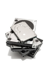 Pile of Hard disk drive HDD isolated on white background. Computer hardware data storage