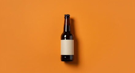 A dark beer bottle with a blank label rests on a vibrant orange background.
