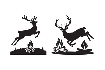 Silhouette of two deer leaping over campfires