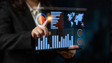 A business professional engages with a digital dashboard displaying various charts and maps, enabling data-driven decision-making in a modern corporate workspace. Impute