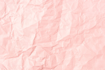 Pink crumpled paper background texture. Full frame