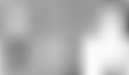 A soft gradient of muted grays and whites blend smoothly in this tranquil image, creating a serene backdrop with subtle tonal variations that evoke peaceful simplicity