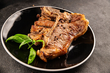 t-bone steak roast cut of meat juicy roast beef tasty snack fresh delicious gourmet food background...