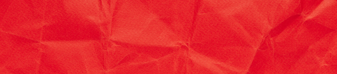 Bright scarlet red long web banner, realistic crumpled paper, tactile textured background
