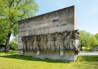 Controversial, historical war memorial in Hamburg, Germany, with relief of marching soldiers and...
